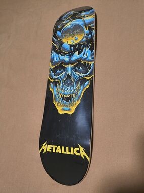 Metallica Skull Graphic Skateboard Deck - Black/Blue/Yellow